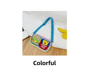 Detail of colorful kids crossbody bag featuring 3D hamburger and French fries patches