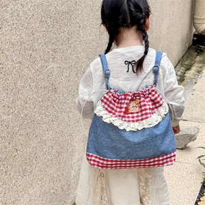 Kids red checkered drawstring backpack with blue denim patchwork and lace trim detail
