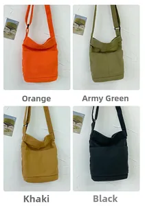 Detailed comparison of canvas crossbody bags in orange, army green, khaki and black