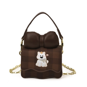 Cute brown plaid children's shoulder bag with puppy embroidery and leather bow detail