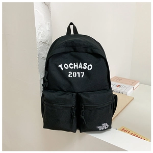 Side view of black canvas school backpack with white Tochaso 2017 letters for students