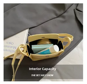 Internal capacity of mini yellow leather crossbody bag showing daily essentials