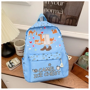 Detail of light blue school backpack with camel illustration and spacious front pocket