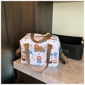 Close-up of lightweight cartoon animal tote bag with lion prints and brown strap