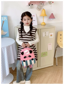 Close-up of pink panda backpack with rainbow straps and cartoon ice cream design