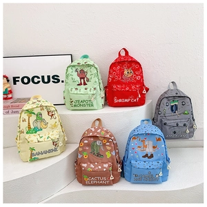 Selection of colorful kids backpacks with cartoon illustrations and front zipper pockets