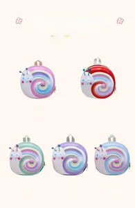 Close-up of cute snail-shaped hardshell backpacks in pink, red, green, purple and blue colors