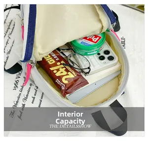 Top view of the interior capacity showing daily essentials inside the drawstring backpack