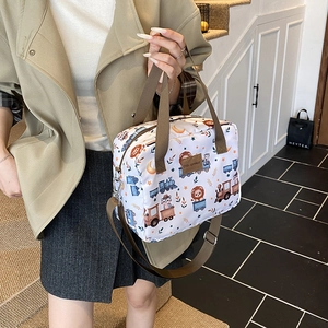 Cartoon animal print tote bag for kids and moms featuring a lion and train design