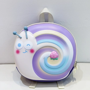 Detail of cute colorful snail cartoon backpack with strawberry pattern and sturdy shell