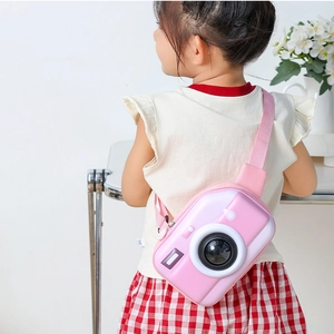 Pink camera-shaped hardshell chest bag for kids with adjustable shoulder strap