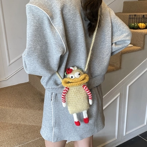 Cute handmade crochet cartoon crossbody bag for kids with big lips and floral accents