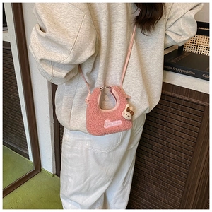 Pink plush rabbit bag for kids with Baxmu embroidery and cute bear charm pendant