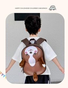 Rear view of child wearing a cute brown 3D animal cartoon EVA eggshell backpack