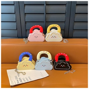Group of cute cloud-shaped mini handbags with smiley embroidery and padded handles