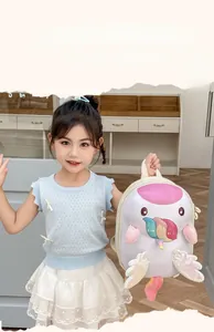 Cute cartoon animal hard shell backpack shown held by a young girl in a cozy indoor setting