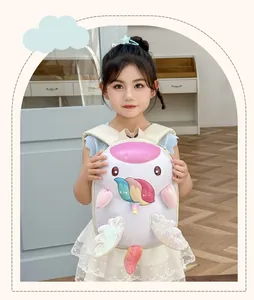 Toddler girl wearing a white cartoon unicorn backpack with rainbow wings and 3D ears