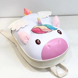 Detail view of unicorn kids backpack showing 3D sequins wings and colorful plush horn