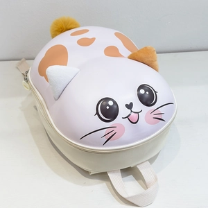 Detail view of cartoon cat toddler backpack with purple hard shell and orange polka dots