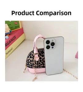 Real size comparison of mini leopard print shell bag with smartphone and gold chain