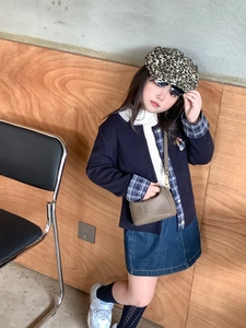 Kids fashion set with denim skirt knit cardigan and brown embossed crossbody bag