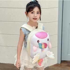 Cute unicorn toddler backpack with colorful horn and plush wings worn by a young girl