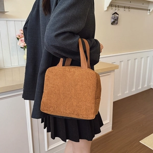 Caramel brown corduroy tote bag for women with wide handles in a minimalist office style