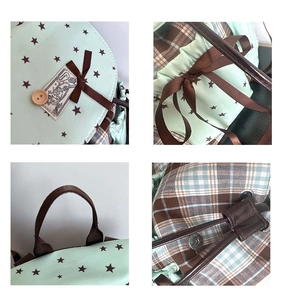 Detail view of mint green plaid backpack featuring wooden buttons and satin drawstring