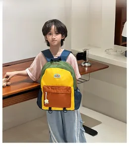 Kids' colorful patchwork backpack in nylon with green yellow and blue panels