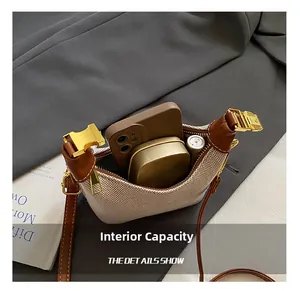 Detail view of the bag interior showing storage space for phone and makeup items