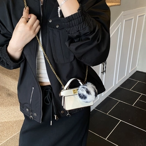 Mini white leather crossbody bag with gold chain and faux fur pompom for kids and toddlers