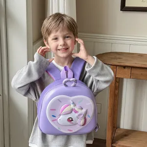3D eggshell backpack for kids featuring a purple unicorn design and wide shoulder straps