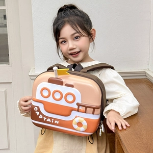 Close-up of a 3D hard shell boat-shaped backpack for kids with CAPTAIN logo print