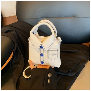 Close-up of white shirt-shaped mini bag with blue buttons and textured litchi leather