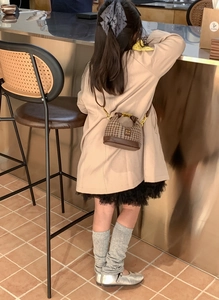 Girl's brown houndstooth mini crossbody bag with vintage handle and gold metal details
