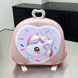 Close-up of pink 3D hardshell toddler backpack featuring a unicorn and heart design