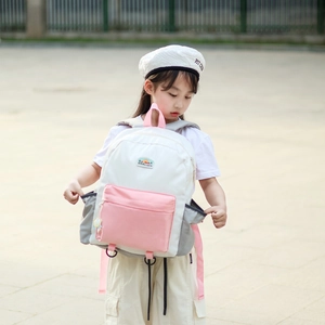 Stylish white and pink kids backpack with ANALUCK embroidery for school and outdoors