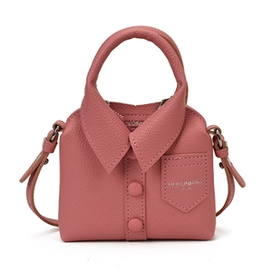Pink shirt-style crossbody bag for girls with button detail and a white background