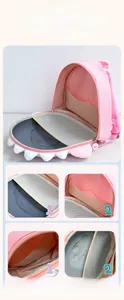 Détails de l'intérieur du sac à dos dinosaure rose avec compartiments et filet de rangement