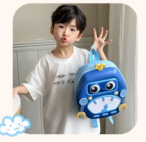 Detailed side view of cartoon robot hard shell backpack with blue straps and hand accents