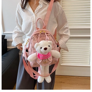 Pink PU leather backpack with letter print and cute white teddy bear plush charm
