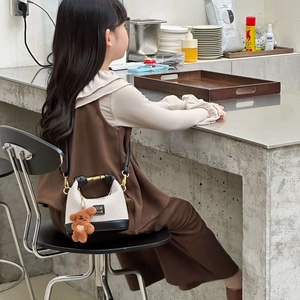 Kids bicolor canvas and black leather crossbody bag with cute plush bear charm
