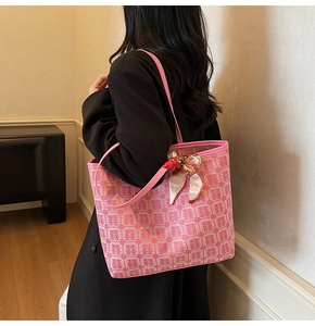 Detail of pink bridal tote bag with red Double Happiness embroidery and floral silk scarf