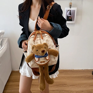 Beige canvas backpack with 3D plush bear and HEYUE print for stylish women