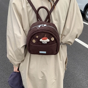 Brown faux suede mini backpack with cute cartoon animal character and retro buttons