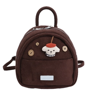 Brown fuzzy mini backpack with cute plush puppy and wooden button details on white background