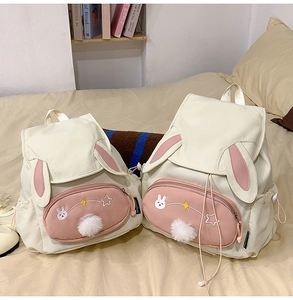 Detailed comparison of large and small Japanese canvas bunny backpacks with cute embroidery