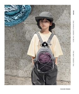 Kids outdoor backpack and sun hat set featuring color-block design and drawstring details