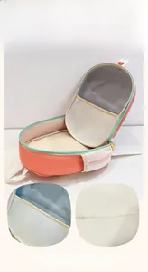 Detail view of the spacious internal compartment with mesh pocket for kids' EVA backpack