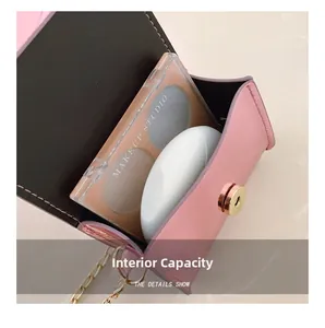 Pink laser surface crossbody bag showing internal capacity with eyeshadow and accessories